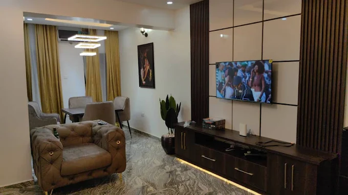 Living room with brown curtains